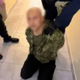 Мужчина с автоматом ходил по жилому комплексу в Киеве